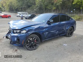 2023 BMW X4 M40i with VIN 5UX43DT09P9P68981, listed as a Copart auction lot 74676194 with 19,421 mi miles and Salvage Title. Bid and sale history available at carsss.com. Image 1.