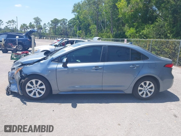 2023 Toyota Corolla LE with VIN 5YFB4MDE9PP016692, listed as a IAAI auction lot 42136141 with 34,671 mi miles and . Bid and sale history available at carsss.com. Image 14.