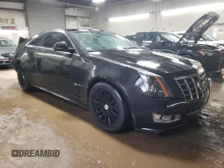 2014 Cadillac CTS Performance z VIN 1G6DG1E37E0103321, wystawiony jako Copart lot #52013005 z przebiegiem 70 394 mil mil oraz Szkody całkowita. Historia ofert i sprzedaży dostępna na DreamBid. Obrazek 4.