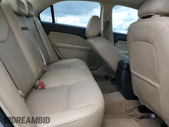 2010 Mercury Milan Premier z VIN 3MEHM0JA6AR631219, wystawiony jako Copart lot #58241505 z przebiegiem 140 037 mil mil oraz Szkody całkowita. Historia ofert i sprzedaży dostępna na DreamBid. Obrazek 10.