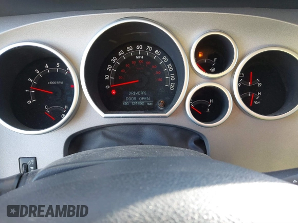 2012 Toyota Tundra 4WD Truck LTD with VIN 5TFHW5F18CX251584, listed as a IAAI auction lot 41054238 with 124,892 mi miles. Bid and sale history available at carsss.com. Image 7.