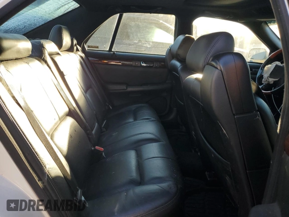 2000 Cadillac Seville Touring STS z VIN 1G6KY5497YU345038, wystawiony jako Copart lot #74315354 z przebiegiem 96 704 mil mil oraz Nie do naprawy • Non repairable. Historia ofert i sprzedaży dostępna na DreamBid. Obrazek 10.