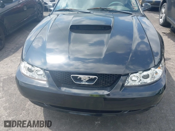 2003 Ford Mustang GT Deluxe z VIN 1FAFP45XX3F417295, wystawiony jako IAAI lot #42229765 z przebiegiem 161 488 mil mil oraz . Historia ofert i sprzedaży dostępna na DreamBid. Obrazek 6.