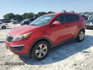 2013 Kia Sportage LX z VIN KNDPB3A29D7510094, wystawiony jako Copart lot #62114385 z przebiegiem 223 859 mil mil oraz Czysty tytuł • Clean title. Historia ofert i sprzedaży dostępna na DreamBid. Obrazek 1.