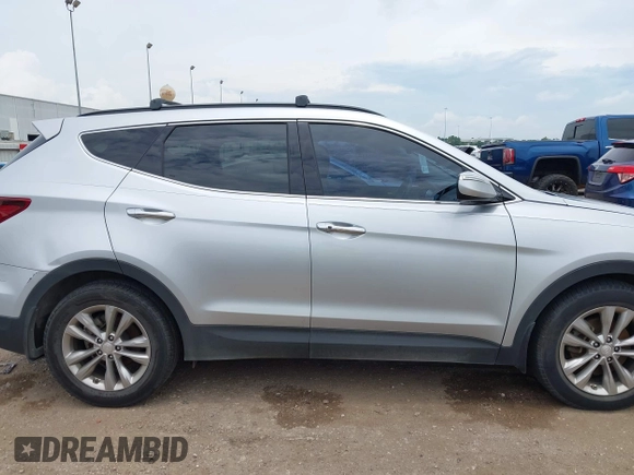2018 Hyundai Santa Fe 2.0T z VIN 5XYZU4LA9JG537310, wystawiony jako IAAI lot #42393689 z przebiegiem Nie podano mil oraz . Historia ofert i sprzedaży dostępna na DreamBid. Obrazek 13.