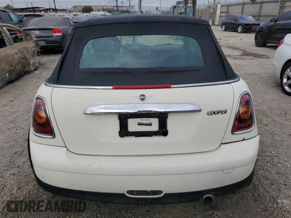 2010 MINI Convertible with VIN WMWMR3C52ATU96951, listed as a Copart auction lot 82038804 with 120,199 mi miles and Clean Title. Bid and sale history available at DreamBid. Image 6.