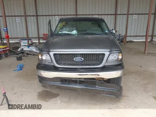 2002 Ford F-150 XL with VIN 1FTRX17242NB82159, listed as a IAAI auction lot 42283839 with 163,685 mi miles and . Bid and sale history available at DreamBid. Image 6.