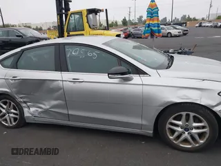2016 Ford Fusion SE z VIN 3FA6P0H73GR144942, wystawiony jako IAAI lot #42770565 z przebiegiem 42 986 mil mil oraz . Historia ofert i sprzedaży dostępna na DreamBid. Obrazek 13.