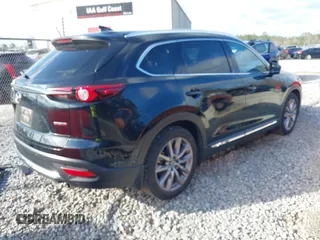2022 Mazda CX-9 Grand Touring with VIN JM3TCBDY0N0612438, listed as a IAAI auction lot 41485756 with 42,476 mi miles. Bid and sale history available at carsss.com. Image 4.