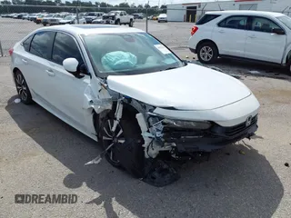 2023 Honda Civic EX z VIN 2HGFE1F74PH306745, wystawiony jako IAAI lot #39856336 z przebiegiem 13 050 mil mil oraz . Historia ofert i sprzedaży dostępna na DreamBid. Obrazek 1.