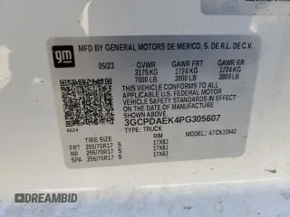 2023 Chevrolet Silverado 1500 with VIN 3GCPDAEK4PG305607, listed as a Copart auction lot 48935655 with 10,480 mi miles and Salvage Title. Bid and sale history available at DreamBid. Image 12.