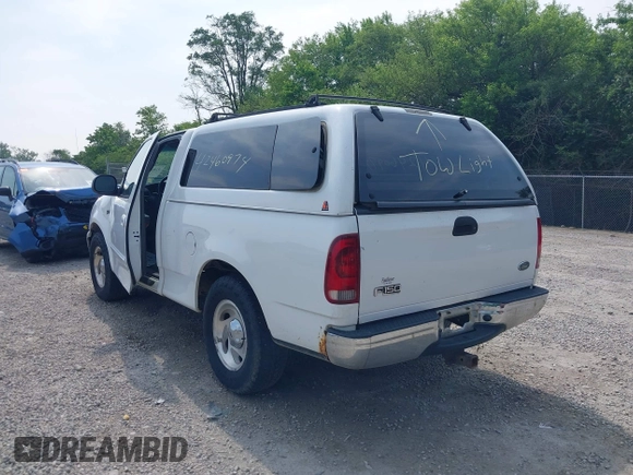 2000 Ford F-150 XL with VIN 1FTZF1720YNB37392, listed as a IAAI auction lot 42460974 with Not provided miles and . Bid and sale history available at DreamBid. Image 3.