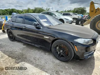 2014 BMW 5 Series 550i with VIN WBAKN9C50ED680744, listed as a Copart auction lot 64983425 with 161,172 mi miles and Clean title. Bid and sale history available at DreamBid. Image 4.