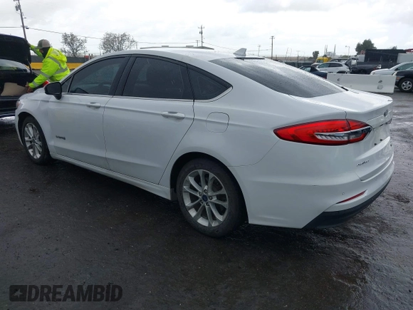 2019 Ford Fusion Hybrid SE with VIN 3FA6P0LU9KR206740, listed as a IAAI auction lot 41933661 with 143,111 mi miles. Bid and sale history available at carsss.com. Image 3.