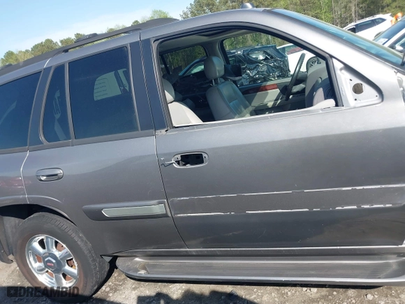 2005 GMC Envoy SLE with VIN 1GKDS13S452306939, listed as a IAAI auction lot 41931667 with 236,955 mi miles. Bid and sale history available at carsss.com. Image 14.