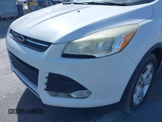 2014 Ford Escape SE with VIN 1FMCU9GX0EUD05633, listed as a IAAI auction lot 41582757 with 103,729 mi miles. Bid and sale history available at carsss.com. Image 12.