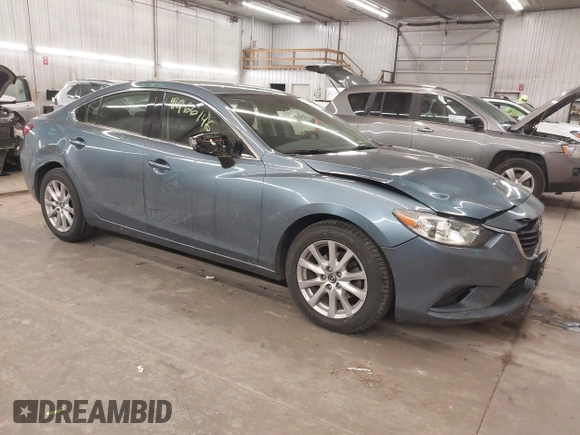2015 Mazda 6 i Sport with VIN JM1GJ1U65F1170793, listed as a IAAI auction lot 41266146 with 125,701 mi miles and . Bid and sale history available at carsss.com. Image 1.
