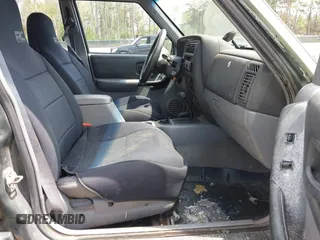 1998 Jeep Cherokee Sport with VIN 1J4FJ68SXWL264165, listed as a IAAI auction lot 42168443 with 244,828 mi miles and . Bid and sale history available at DreamBid. Image 5.