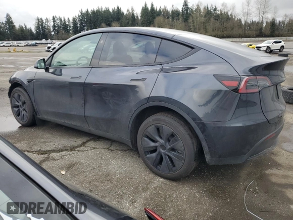 2025 Tesla Model Y Long Range with VIN 7SAYGDEE5SF296652, listed as a Copart auction lot 46664465 with 452 mi miles and Salvage Title. Bid and sale history available at DreamBid. Image 2.