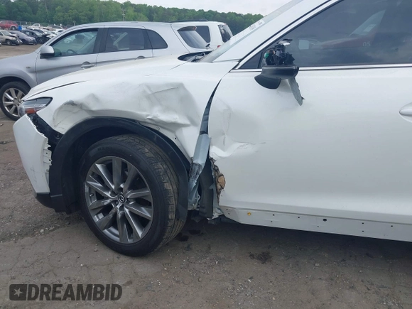 2019 Mazda CX-9 Signature with VIN JM3TCBEY8K0327724, listed as a IAAI auction lot 42068769 with 77,823 mi miles and . Bid and sale history available at DreamBid. Image 6.