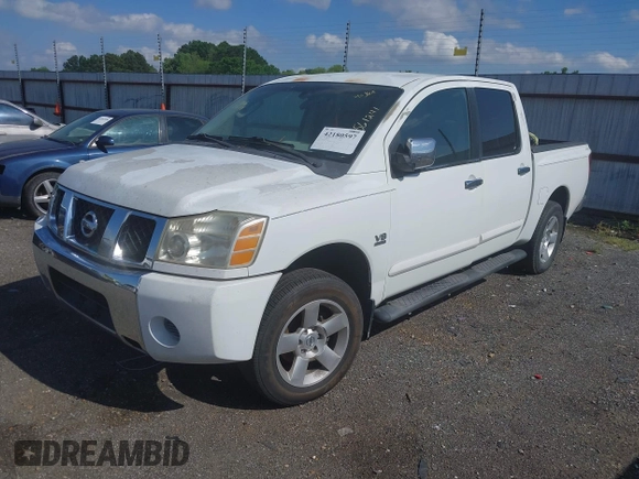 2004 Nissan Titan LE with VIN 1N6AA07A04N561241, listed as a IAAI auction lot 42180597 with 166,529 mi miles and . Bid and sale history available at DreamBid. Image 2.