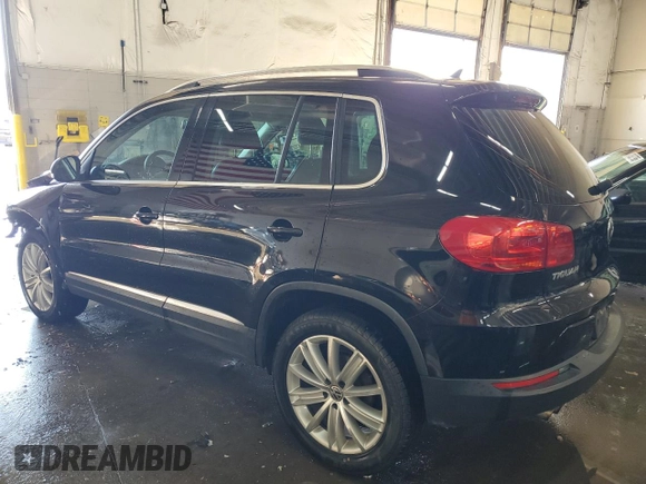 2013 Volkswagen Tiguan SE z VIN WVGBV7AX9DW529234, wystawiony jako Copart lot #41610635 z przebiegiem 130 566 mil mil oraz Szkoda całkowita • Salvage title. Historia ofert i sprzedaży dostępna na DreamBid. Obrazek 2.