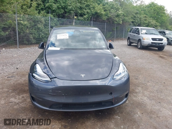 2021 Tesla Model Y Long Range z VIN 5YJYGDEE6MF070068, wystawiony jako IAAI lot #42224634 z przebiegiem 33 850 mil mil oraz . Historia ofert i sprzedaży dostępna na DreamBid. Obrazek 12.
