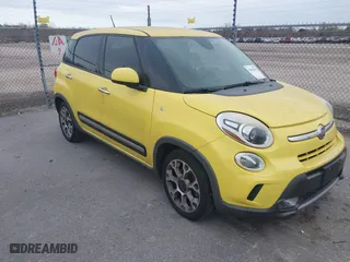 2015 FIAT 500L Urbana Trekking with VIN ZFBCFADH0FZ030995, listed as a IAAI auction lot 41653415 with 115,629 mi miles. Bid and sale history available at carsss.com. Image 1.