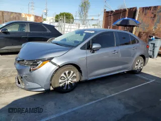 2020 Toyota Corolla Hybrid LE with VIN JTDEBRBE5LJ019123, listed as a Copart auction lot 50359365 with 59,102 mi miles and Salvage Title. Bid and sale history available at carsss.com. Image 1.