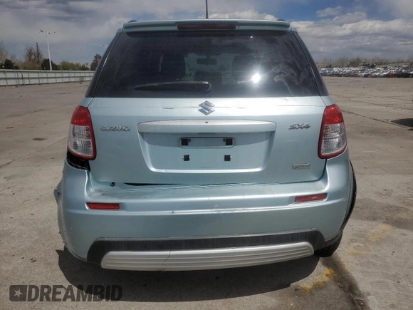 2009 Suzuki SX4 Touring AWD z VIN JS2YB417396203092, wystawiony jako Copart lot #53965685 z przebiegiem 153 701 mil mil oraz Szkoda całkowita • Salvage title. Historia ofert i sprzedaży dostępna na DreamBid. Obrazek 6.