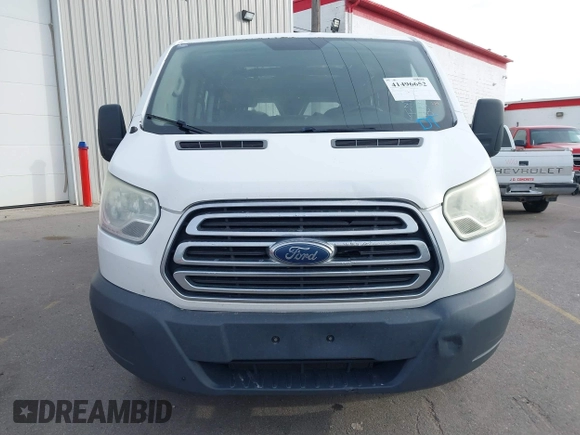 2015 Ford Transit Cargo with VIN 1FTNR1ZM7FKB03582, listed as a IAAI auction lot 41496652 with 205,663 mi miles and . Bid and sale history available at DreamBid. Image 12.