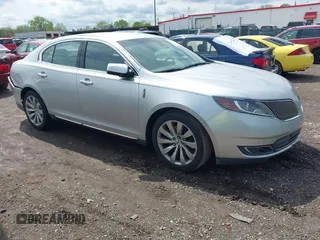 2013 Lincoln MKS with VIN 1LNHL9DK6DG600685, listed as a IAAI auction lot 42171998 with 165,933 mi miles and . Bid and sale history available at DreamBid. Image 1.