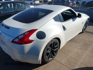 2017 Nissan 370Z with VIN JN1AZ4EHXHM954875, listed as a IAAI auction lot 41641554 with 101,093 mi miles. Bid and sale history available at carsss.com. Image 4.