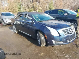 2015 Cadillac XTS Luxury with VIN 2G61N5S30F9196193, listed as a IAAI auction lot 40879852 with 87,416 mi miles and . Bid and sale history available at carsss.com. Image 1.