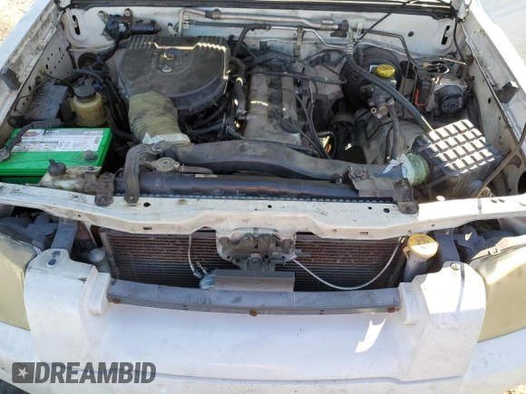 2003 Nissan Frontier XE with VIN 1N6DD26T63C467751, listed as a Copart auction lot 41842545 with 397,556 mi miles and Salvage title. Bid and sale history available at DreamBid. Image 11.