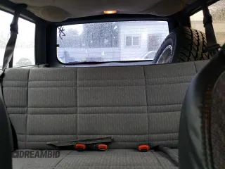 1999 Jeep Cherokee SE with VIN 1J4FF28S9XL645291, listed as a Copart auction lot 87064124 with Not provided miles and Salvage title. Bid and sale history available at DreamBid. Image 10.
