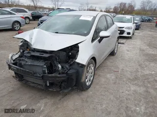 2014 Kia Rio LX with VIN KNADM5A34E6338174, listed as a IAAI auction lot 42039451 with 87,528 mi miles. Bid and sale history available at carsss.com. Image 2.