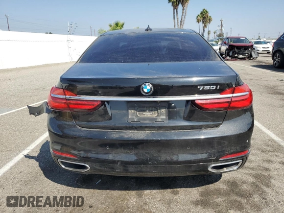 2016 BMW 7 Series 740i with VIN WBA7E2C59GG547804, listed as a Copart auction lot 68620463 with 122,937 mi miles. Bid and sale history available at carsss.com. Image 6.