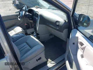 2006 Chrysler Town & Country Touring with VIN 2A8GP54L06R727898, listed as a IAAI auction lot 41893586 with 119,296 mi miles and . Bid and sale history available at DreamBid. Image 5.