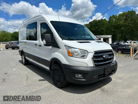 2020 Ford Transit Cargo z VIN 1FTBR1CG3LKB36452, wystawiony jako Copart lot #58659545 z przebiegiem 171 504 mil mil oraz Tytuł czysty. Historia ofert i sprzedaży dostępna na DreamBid. Obrazek 4.
