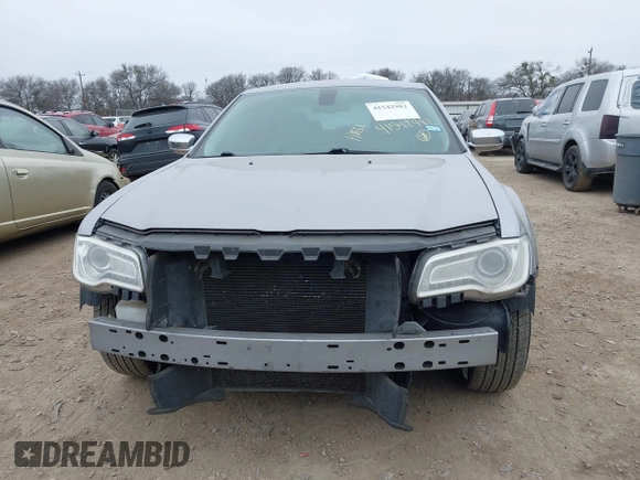 2015 Chrysler 300 C with VIN 2C3CCAEG0FH779540, listed as a IAAI auction lot 41542982 with 211,348 mi miles and . Bid and sale history available at carsss.com. Image 6.