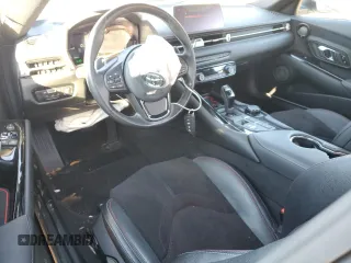 2022 Toyota Supra 2.0 with VIN WZ1DB2C08NW050265, listed as a Copart auction lot 88882465 with 14,576 mi miles and Salvage title. Bid and sale history available at DreamBid. Image 8.