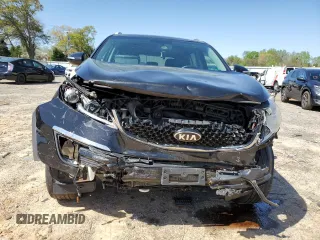 2016 Kia Sportage EX z VIN KNDPCCAC8G7827374, wystawiony jako Copart lot #52326215 z przebiegiem 152 745 mil mil oraz Szkoda całkowita • Salvage title. Historia ofert i sprzedaży dostępna na DreamBid. Obrazek 5.