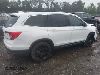 2021 Honda Pilot Special Edition with VIN 5FNYF6H28MB048296, listed as a IAAI auction lot 40012452 with 50,011 mi miles. Bid and sale history available at carsss.com. Image 4.
