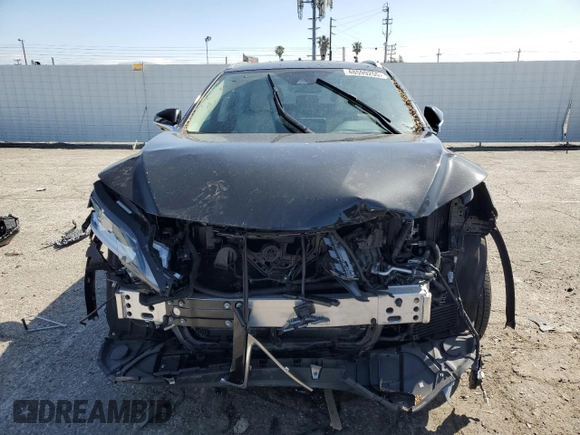 2021 Lexus RX 450h with VIN 2T2HGMDA9MC067213, listed as a Copart auction lot 48599255 with 28,234 mi miles and Salvage title. Bid and sale history available at DreamBid. Image 5.