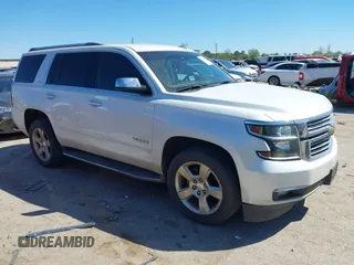 2016 Chevrolet Tahoe LTZ with VIN 1GNSCCKC1GR404754, listed as a IAAI auction lot 41831879 with 139,681 mi miles and . Bid and sale history available at DreamBid. Image 1.