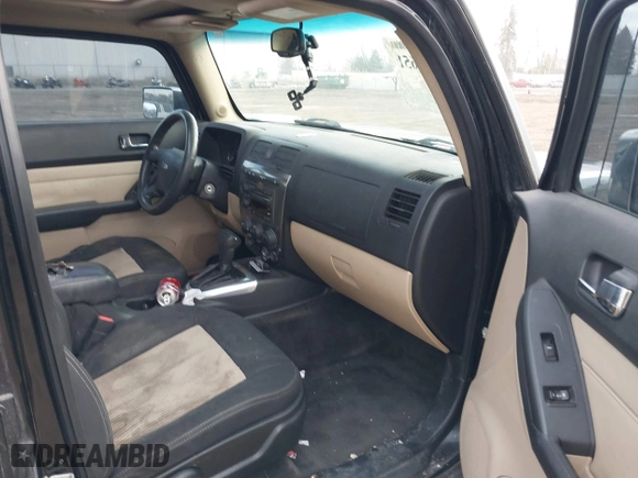 2008 Hummer H3 SUV with VIN 5GTEN13E288105892, listed as a IAAI auction lot 41812651 with 217,426 mi miles. Bid and sale history available at carsss.com. Image 5.