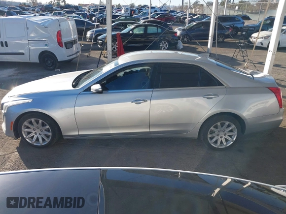 2015 Cadillac CTS AWD z VIN 1G6AW5SX2F0104981, wystawiony jako IAAI lot #41276740 z przebiegiem 87 128 mil mil oraz . Historia ofert i sprzedaży dostępna na DreamBid. Obrazek 14.