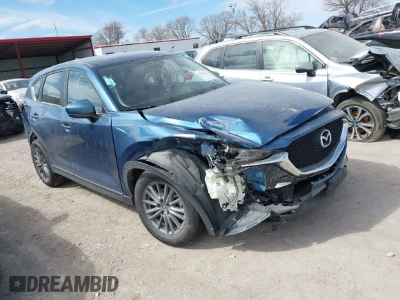 2018 Mazda CX-5 Sport with VIN JM3KFBBM8J0400741, listed as a IAAI auction lot 41860323 with 54,911 mi miles. Bid and sale history available at carsss.com. Image 1.