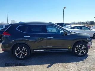 2017 Nissan Rogue SL with VIN JN8AT2MT8HW395084, listed as a IAAI auction lot 41858587 with 219,849 mi miles and . Bid and sale history available at DreamBid. Image 13.